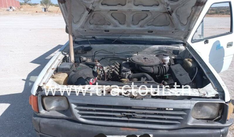 À vendre Camionnette 2 portes avec benne Isuzu complet