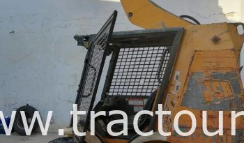 À vendre Chargeuse compacte avec godet JCB 185 complet