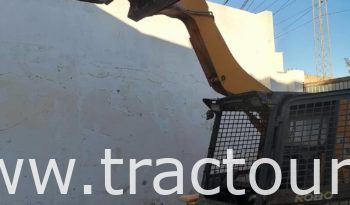 À vendre Chargeuse compacte avec godet JCB 185 complet