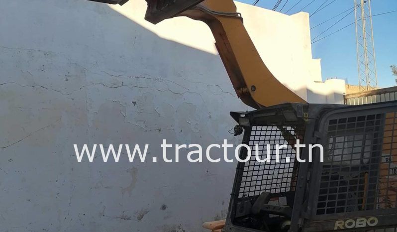 À vendre Chargeuse compacte avec godet JCB 185 complet