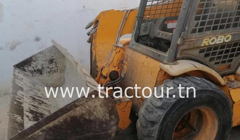 À vendre Chargeuse compacte avec godet JCB 185 complet