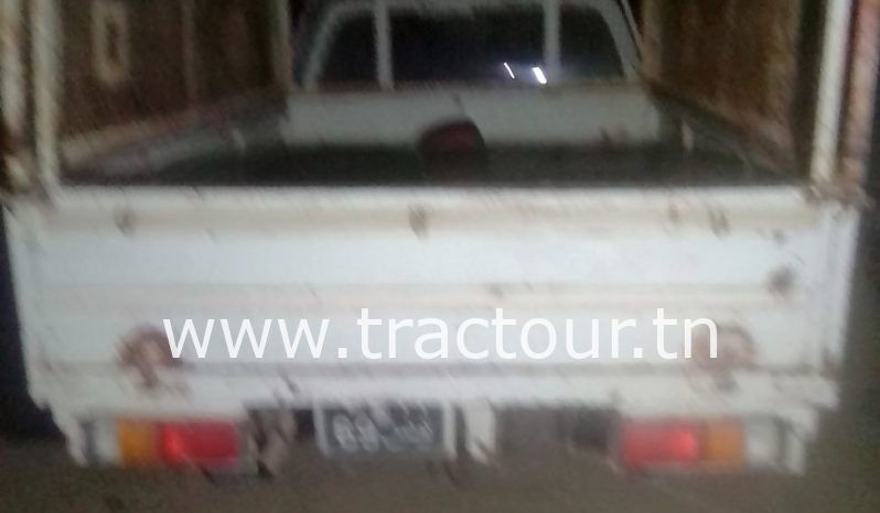 À vendre Camionnette 2 portes avec benne Isuzu complet