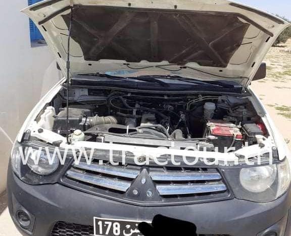 À vendre Camionnette 2 portes avec benne Mitsubishi L200 complet