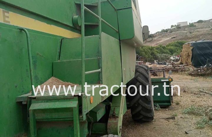 À vendre Moissonneuse batteuse à trémie et vis John Deere 1075 complet