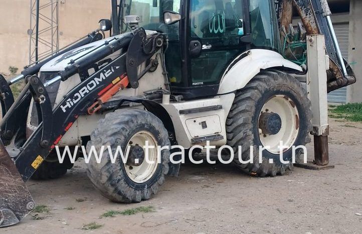 À vendre Tractopelle Hidromek 102B avec moteur John Deere (2012) complet