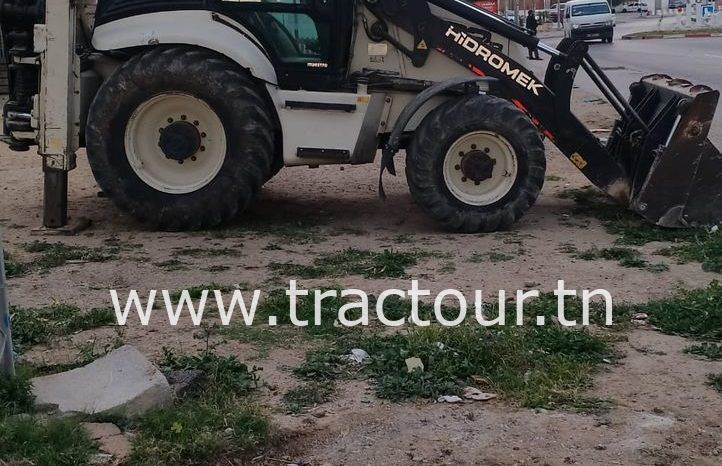 À vendre Tractopelle Hidromek 102B avec moteur John Deere (2012) complet